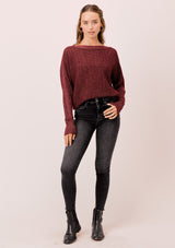 [Color: Merlot/Gold] A sparkly and sophisticated bateau neck sweater featuring open stitch details and flattering dolman sleeves. The subtle metallic detail catches the light as you move.