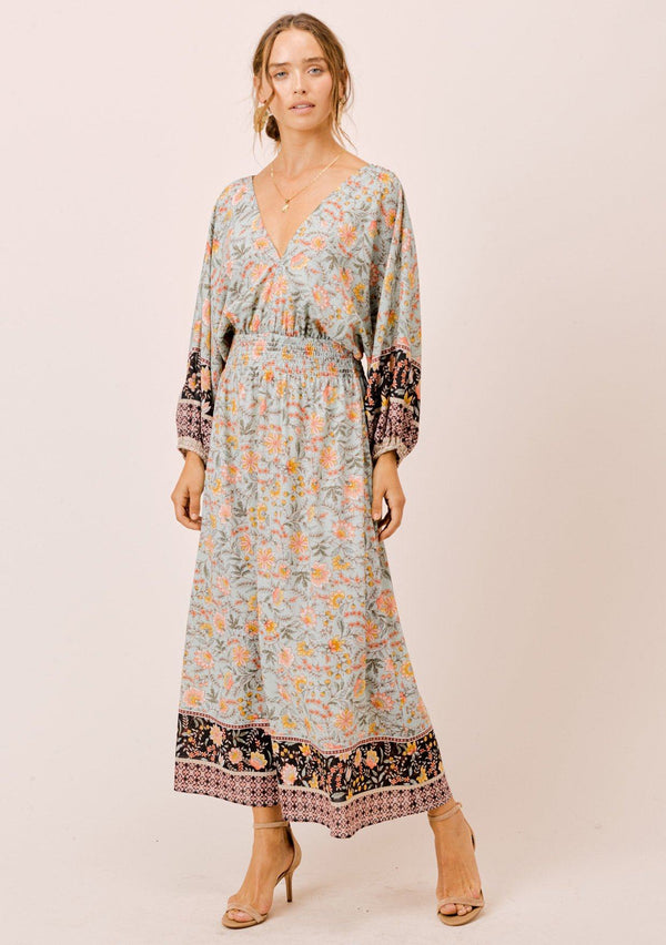 [Color: Mint] Lovestitch relaxed fit light blue floral long volume sleeve maxi dress with a flattering smocked waist, V-neckline and open tie-back detail. The perfect casual dreamy maxi dress.