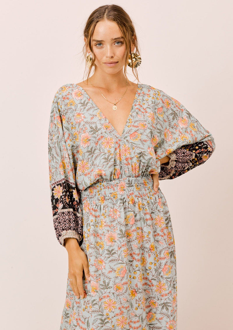 [Color: Mint] Lovestitch relaxed fit light blue floral long volume sleeve maxi dress with a flattering smocked waist, V-neckline and open tie-back detail. The perfect casual dreamy maxi dress.