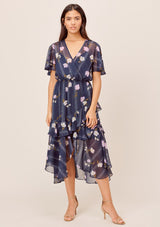 [Color: Navy/Lilac] Lovestitch navy/lilac Floral printed, short sleeve, surplice maxi dress with ruffled details and front slit. 