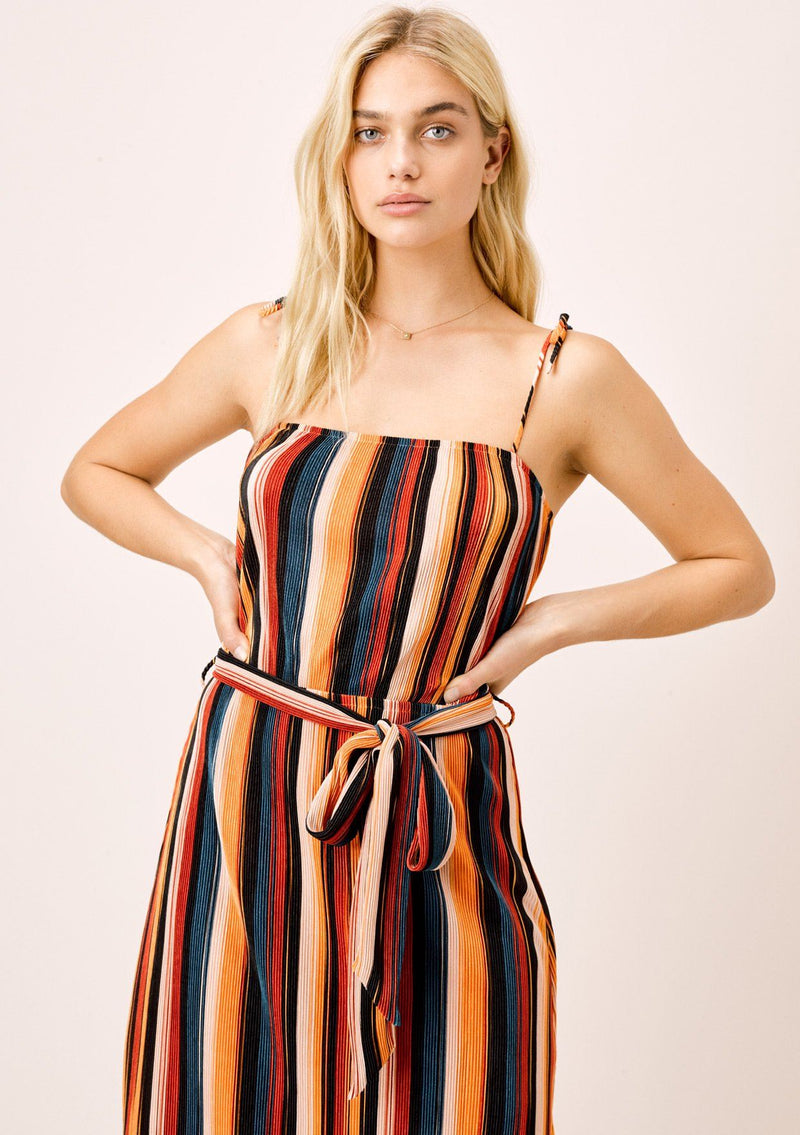 [Color: Black/Spice/Teal] A casual pleated midi dress. The adjustable tie shoulder spaghetti strap and multicolor stripes add a retro feel, while the self tie belt adds definition.