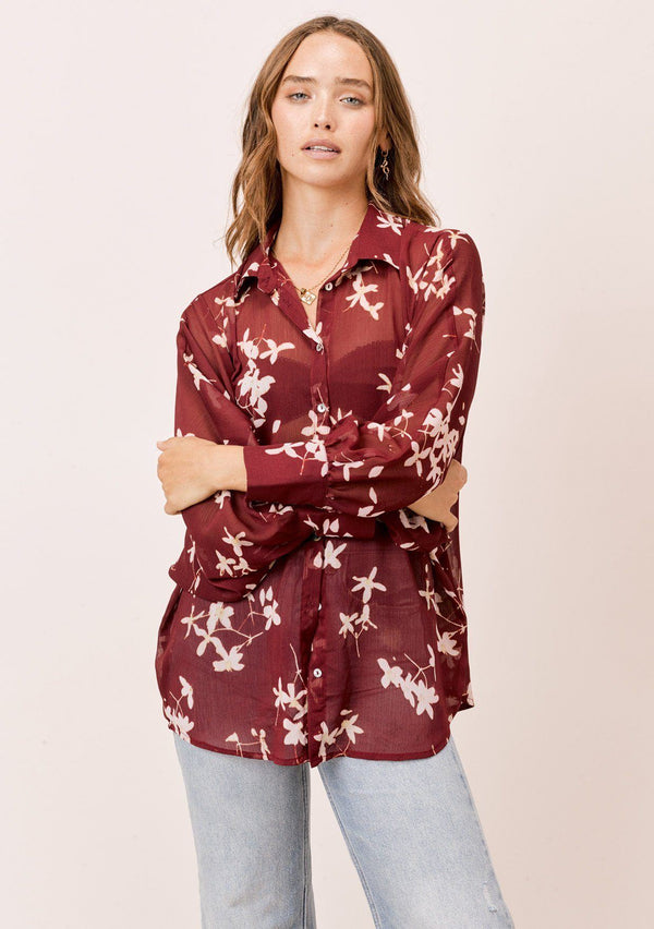 [Color: Brick/Rosewater] A versatile floral chiffon top, featuring long dolman sleeves and a billowy silhouette. Shown here with a camisole underneath.