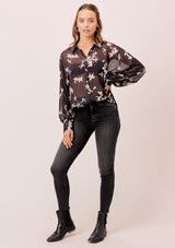 [Color: Midnight/Champagne] A versatile floral chiffon top, featuring long dolman sleeves and a billowy silhouette. Shown here with a camisole underneath.