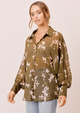 [Color: Olive/Rosewater] A versatile floral chiffon top, featuring long dolman sleeves and a billowy silhouette. Shown here with a camisole underneath.