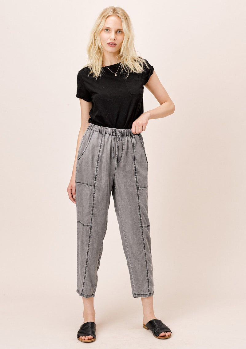 [Color: Acid Black] Lovestitch acid indigo wash jogger pant with seamed detail and elastic drawstring waist.