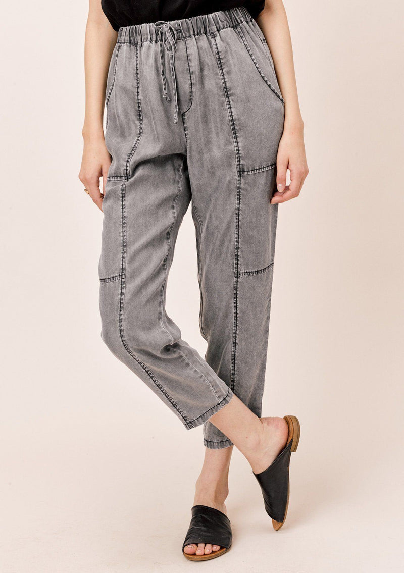 [Color: Acid Black] Lovestitch acid indigo wash jogger pant with seamed detail and elastic drawstring waist.