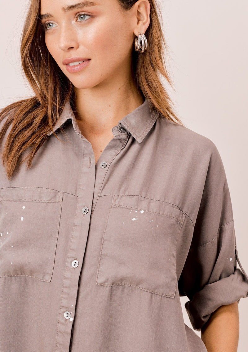[Color: Mushroom] Lovestitch mushroom short sleeve, tencel, buttondown shirt with roll tab sleeves and paint splatter detail. 