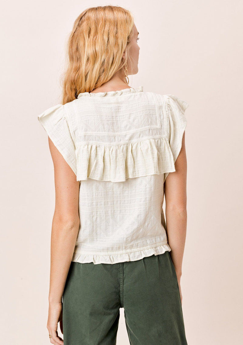 [Color: Vanilla] A pretty bohemian chic top in a multi textured cotton. Featuring delicate lattice trim inserts, a high neckline, and flirty ruffle details throughout.