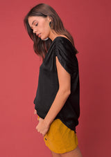 [Color: Black] A washed satin top, featuring a flattering gathered short sleeve detail, a plunging v neckline and gathered details along the back yoke. 