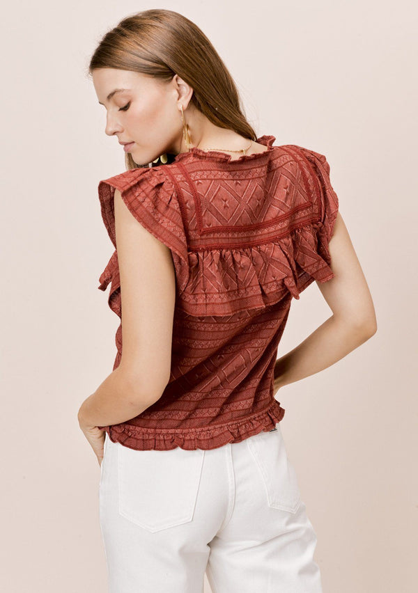 [Color: Brick] A pretty bohemian chic top in a multi textured cotton. Featuring delicate lattice trim inserts, a high neckline, and flirty ruffle details throughout.
