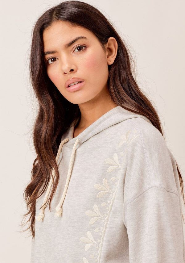 [Color: Heather Grey] Lovestitch Embroidered, French terry cropped hoodie with raw edge and contrast rib cuffs. 