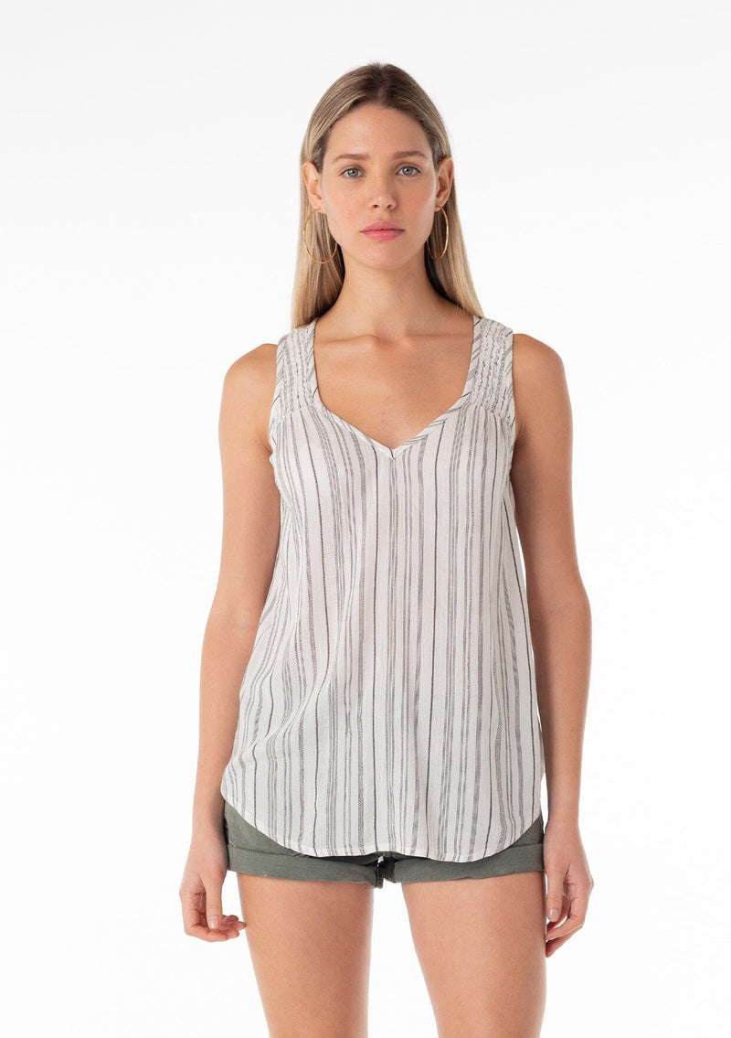 [Color: Off White/Black] A front facing image of a blonde model wearing a casual bohemian spring tank top in an off white and black stripe. With a v neckline, a smocked yoke detail, and a relaxed fit. 