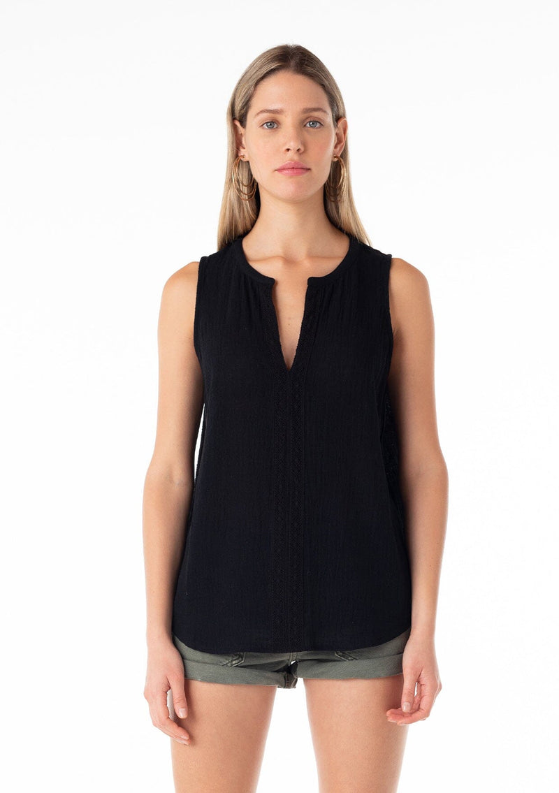 [Color: Black] A front facing image of a blonde model wearing a bohemian black cotton tank top with a split v neckline, embroidered trim, and a relaxed fit. 