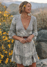 [Color: Lav.Grey/Ivory] Vintage inspired light blue classic bohemian paisley wrap dress with a deep V-neckline and volume ruffle sleeves and hem.