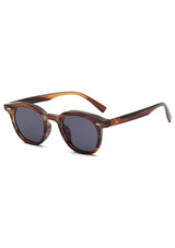[Color: Tortoise Shell] INDY medium sized sunglasses with retro round lenses and a tortoise shell frame. 