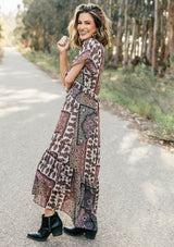 [Color: Midnight/Sand] Lovestitch floral paisley printed, flutter sleeve maxi dress with tiered, ruffled detail.