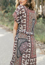 [Color: Midnight/Sand] Lovestitch floral paisley printed, flutter sleeve maxi dress with tiered, ruffled detail.