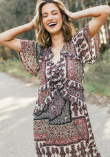 [Color: Midnight/Sand] Lovestitch floral paisley printed, flutter sleeve maxi dress with tiered, ruffled detail.