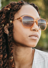 [Color: Tangerine] Chic oversize sunglasses in an acetate frame. 