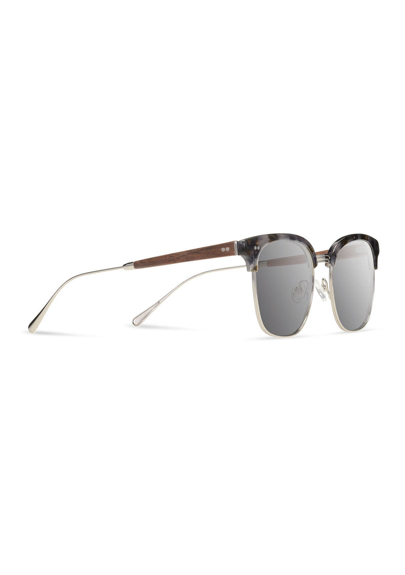 [Color: Tundra] Vintage inspired grey sunglasses with a bowed brow line and lower wire design.