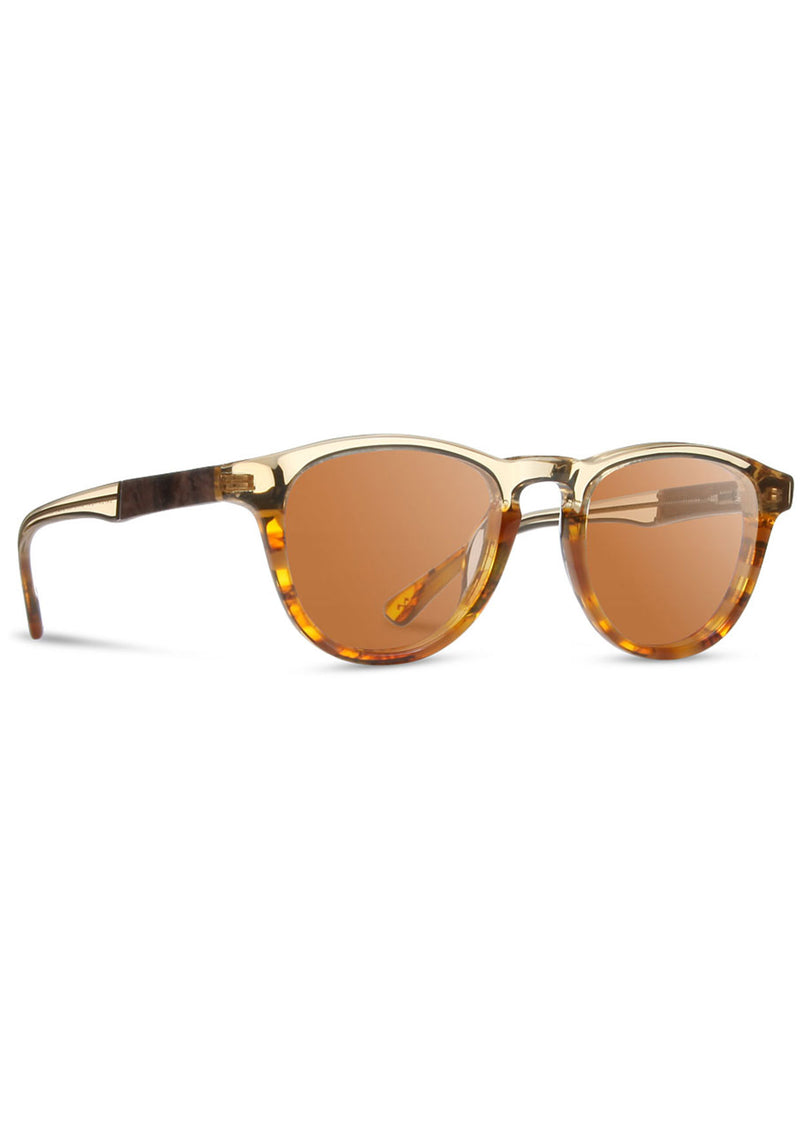 [Color: Canyon] Sunglasses with a warm brown lens and a wood inlay. 