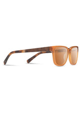 [Color: Matte Apricot] Classic acetate sunglasses with a sweeping, raised brow line and rectangular lenses. 